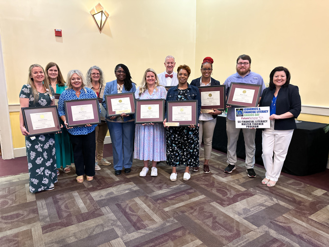 Group photo of the 2024 Graduates of the SC Financial Literacy Master Teacher Program holding their certificates