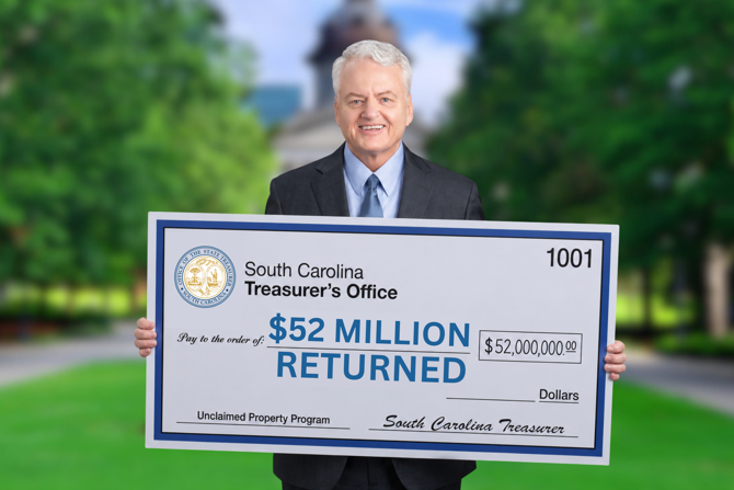 state treasurers office holding a check
